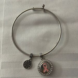 Ginger Snaps silver breast cancer awareness bangle charm bracelet.